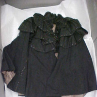 Front View of Black Capelet with Jet Beads and Ruffles