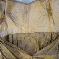 Interior View of Gold Silk Jacquard Dress with Floral Motif
