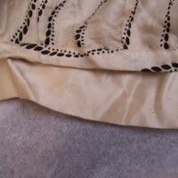 Detail View of Cream and Black Printed Silk Dress with Black Lace