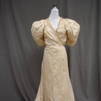 Front View of Ivory Silk Faille Gown with Bows