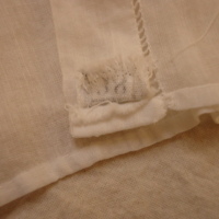 Label View of White Shirtwaist with Added Collar and Tucks
