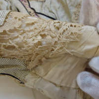 Condition View of Ivory Lace Bodice with Lavender Bows