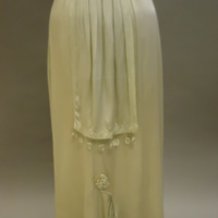 Detail View of Light Green Silk Gown with Lace