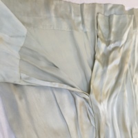 Detail View of Light Green Silk Gown with Lace