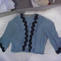 Front View of Blue Bodice with Black Floral Trim
