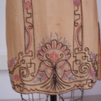 Detail View of Gold Dress with Black Beading