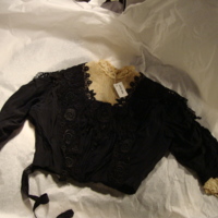 Front View of Black Bodice with Tan Lace