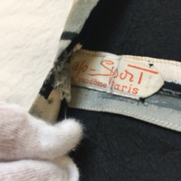 Label View of Black and White Striped Dress
