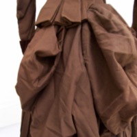 Detail View of Brown Wool and Velvet Bustle Dress