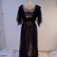 Back View of Black Blue and Gold Multilayered Dress