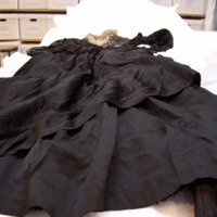 Detail View of Black Silk Dress with Train