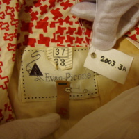 View of Label in Red and White Print Ensemble